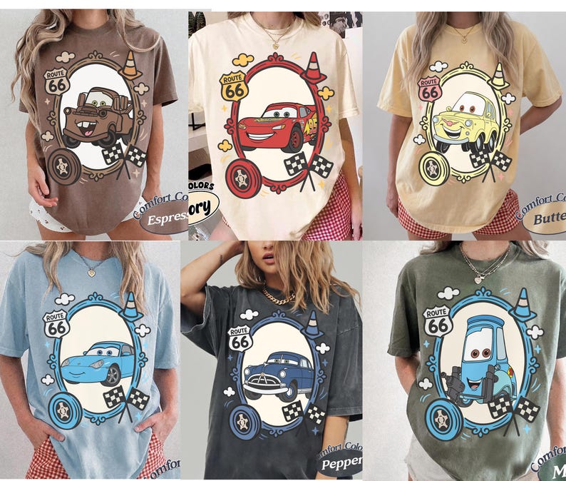 May include: Six t-shirts in different colours, each with a cartoon car design inside a Route 66 themed frame. The shirts are in shades of brown, cream, yellow, blue, grey, and green. The text "Route 66" is visible on each shirt.