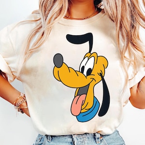 May include: A set of three ceramic mugs with a speckled, matte finish in cream, light grey, and dark grey. Each mug has a simple, minimalist design and a rounded handle.