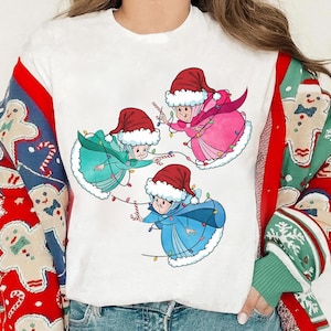 Disney Sleeping Beauty Good Fairies Shirt, Flora Fauna Merryweather Christmas Light, Santa Costume Tee, Disneyland Christmas Matching Shirt
