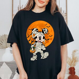 Disney Minnie Mouse Mickey Mouse Mummy Moon Pumpkin Lantern Halloween Shirt, Disneyland Halloween Matching Shirt, Halloween Party Gift 2026 image 2