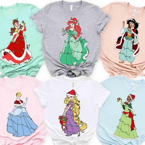 Koszulka z Disney Princess Christmas Lights, koszulka z Elsą Moaną i Jasminą z Meridą, koszulka świąteczna z Disney Princess, prezenty na urodziny księżniczki zdjęcie 1