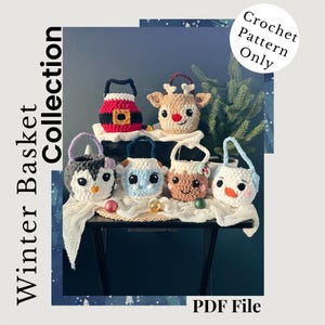 May include: A display of seven crocheted winter-themed baskets, featuring Santa, reindeer, penguin, and snowman characters. The baskets are arranged on a table. Text includes "Winter Basket Collection" and "Crochet Pattern Only".