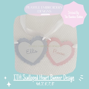 May include: Two scalloped heart-shaped banners with the names "Ellis" and "Reese" embroidered on them. The banners are in blue and pink gingham fabric and are connected by a white ribbon. The banner is for an in-the-hoop embroidery project and is available in sizes 4x4, 5, 6, 7, and 8 inches.