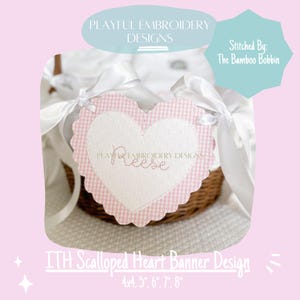 May include: A pink and white scalloped heart banner with the text "Reese" embroidered in pink thread. The banner is 4x4 inches, 5 inches, 6 inches, 7 inches, and 8 inches in size.