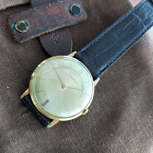Vintage Olma 1940s Gentleman Swiss watch WW2 Era Mechanical Gold filled