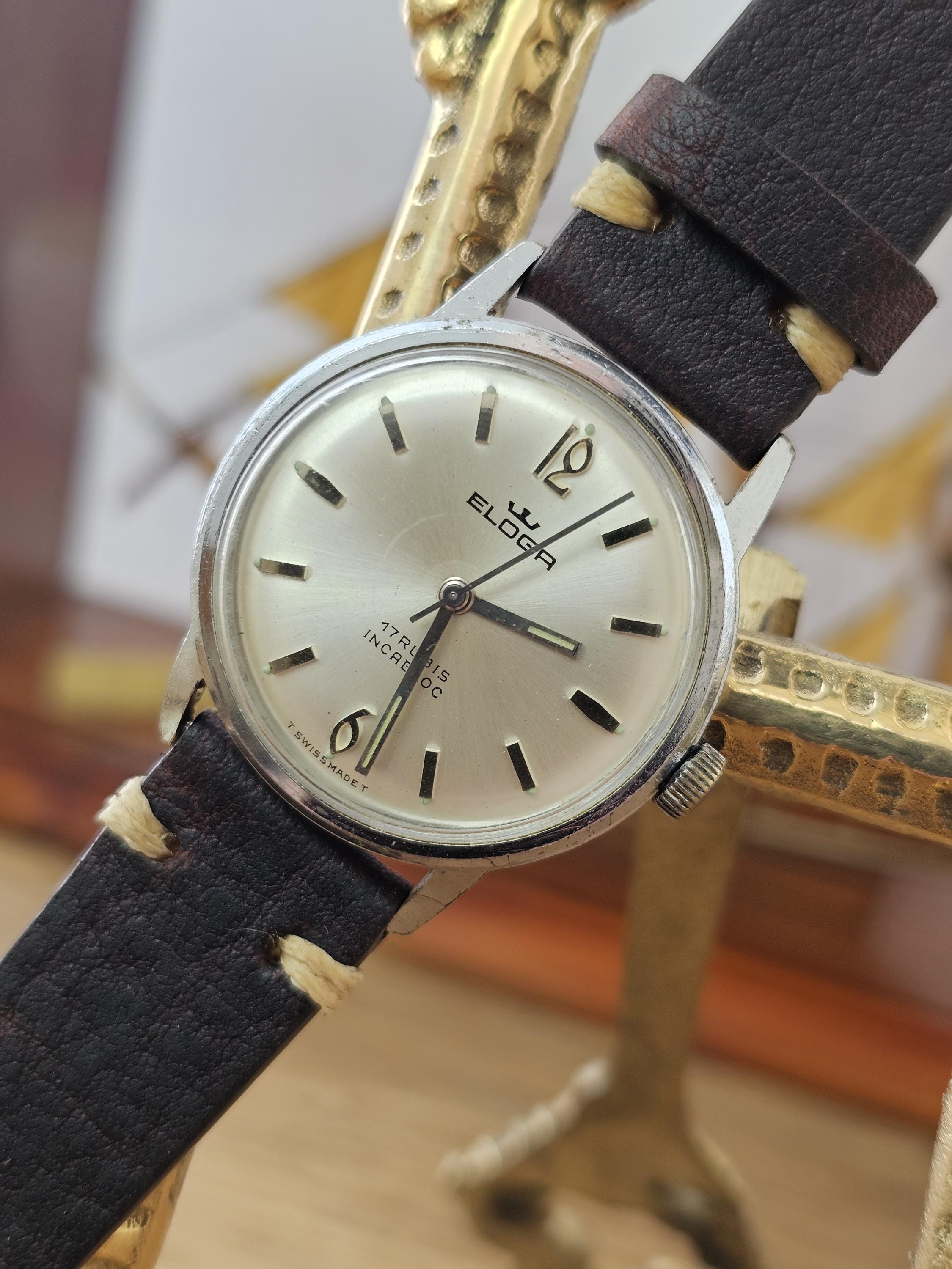 ELOGA エローガ スイス製手巻腕時計 1950年代製 カレンダーウォッチ Eloga watch - Etsy 日本