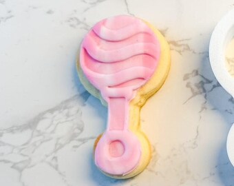 Cookie and fondant stamp baby shower rattle