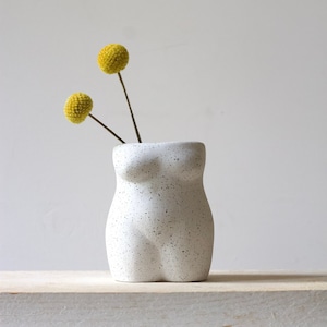 Woman's body vase made of concrete