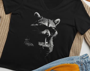 Raccoon Relaxed V-Neck Drinking Iced Coffee, Minimalist, High-contrast Monochrome Pop-Art Women's T-shirt