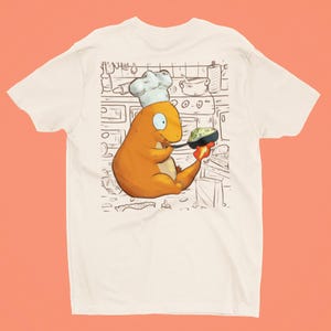 Camiseta Charmander cozinhando na cozinha | Arte do chef Charmander | Charmander fofo e bobo com chama