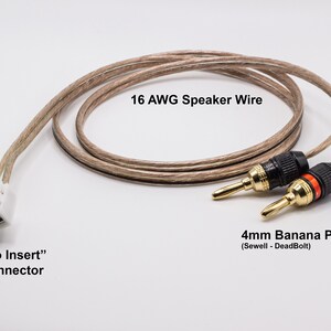 May include: A close-up of 16 AWG speaker wire with 4mm banana plugs. The wire is beige and brown with a white "Push to Insert" wire connector. The banana plugs are gold-plated with black and red accents.