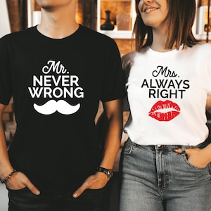 May include: A couple wearing matching t-shirts. The man's shirt is black with white text that says "Mr. Never Wrong" and a white mustache. The woman's shirt is white with black text that says "Mrs. Always Right" and a red lipstick kiss.