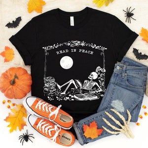 Halloween Read In Peace T-shirt,Halloween Ghost Reading T-shirt,Funny Halloween Skeleton T-shirt,Spooky Season T-shirt,Ghost Reading T-shirt