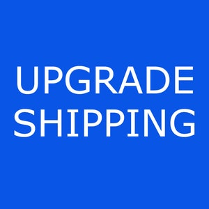 May include: A blue background with white text that reads "UPGRADE SHIPPING".