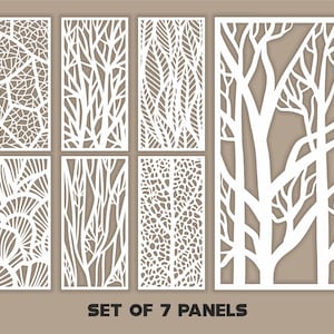 Może przedstawiać: Zestaw 7 białych paneli dekoracyjnych z różnymi wzorami wyciętymi inspirowanymi naturą. Panele przedstawiają wzory drzew, liści i abstrakcyjnych kształtów geometrycznych. Tekst "SET OF 7 PANELS" jest wyświetlany na dole.