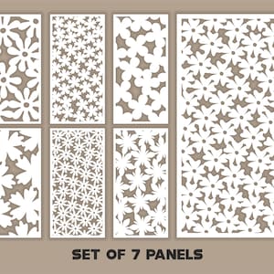 May include: A set of 7 white decorative panels with floral cut-out designs. The panels showcase diverse flower patterns, varying in density and arrangement. The text "SET OF 7 PANELS" is displayed at the bottom in a bold font.