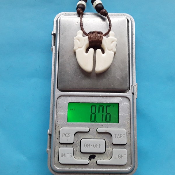 Lingling-o Ifugao Igorot Bontoc cow bone pendant necklace tribal rice god Bulol