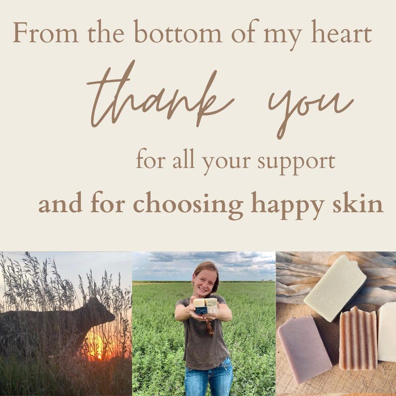 Peut inclure: Une femme debout dans un champ tenant quatre barres de savon artisanal. Le savon est de diff&eacute;rentes couleurs, notamment vert, marron et violet. Le texte "From the bottom of my heart thank you for all your support and for choosing happy skin" est affich&eacute; au-dessus de l'image.