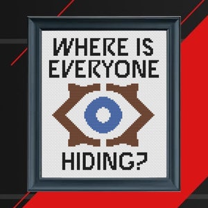 May include: A black and white cross-stitch pattern with the text "WHERE IS EVERYONE HIDING?" and a stylised eye with a blue iris.
