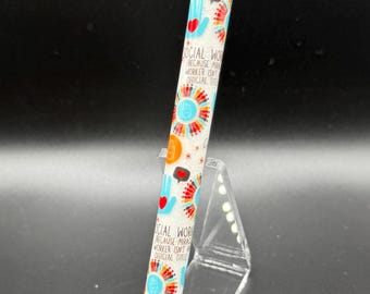 Penna in gel epossidico glitterato per assistente sociale