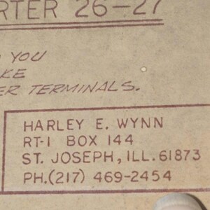 May include: A close-up of a vintage document with text. The document has the words "TARTER 26-27" at the top. Below, it reads "SO YOU MAKE ROPER TERMINALS." A rectangular box contains the name "HARLEY E. WYNN" and contact information.