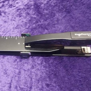 1 Swingline long reach stapler,professional series. Model #34121