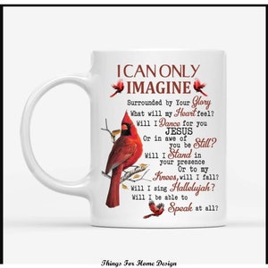 May include: White ceramic mug with a red cardinal bird design. The mug features the text "I can only imagine" and a poem about faith and the presence of Jesus.