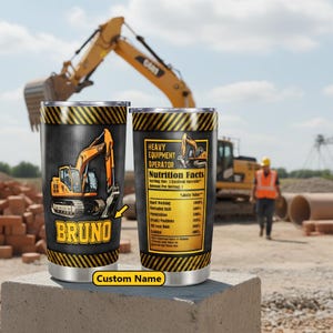 May include: Two stainless steel insulated tumblers with a black and yellow hazard stripe design. One features an orange excavator graphic and the name "BRUNO". The other has "Heavy Equipment Operator" and "Nutrition Facts" text.