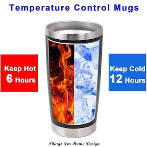 Puede incluir: Taza de viaje de acero inoxidable con tapa negra y un gr&aacute;fico de llamas en un lado y cubitos de hielo en el otro. La taza tiene texto que dice "Keep Hot 6 Hours" y "Keep Cold 12 Hours".