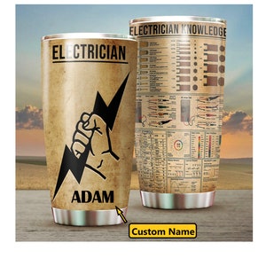 May include: A stainless steel tumbler with a vintage-style design featuring an electrician's symbol, a lightning bolt, and the word "ELECTRICIAN". The tumbler also has a personalized name, "ADAM", printed on it. The background is a faded brown color with a distressed look.