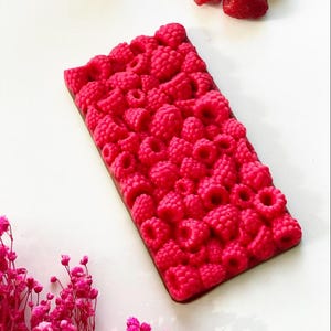 Chocolate bar, Raspberry imitation (white colored chocolate) . Milk chocolate base, Belgian chocolates, super delicious, 100% handmade.
