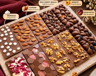 May include: A collection of 10 chocolate bars labeled choco.tat, featuring various toppings including almonds, rice crispy balls, apricots, fresh dates, meringue, walnuts, dried raspberries, and dried figs, arranged on a textured surface.