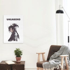 May include: A black and white illustration of a samurai warrior with the word "VAGABOND" printed above the image.