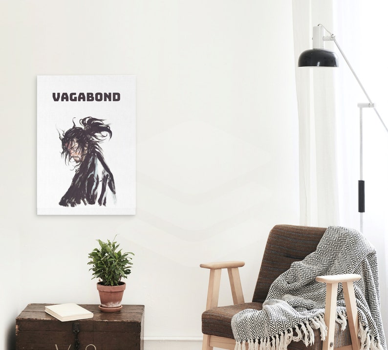 May include: A black and white illustration of a samurai warrior with the word "VAGABOND" printed above the image.