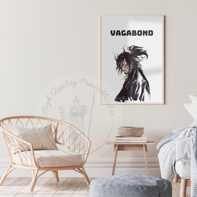 May include: A black and white illustration of a character from the manga series "Vagabond". The character is a samurai with long black hair and a beard. The illustration is on a white background with the word "Vagabond" in black text at the top.