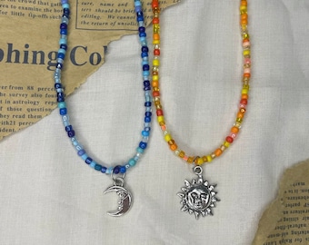 Sun and moon beaded friendship BFF necklace set // best friend celestial charm necklaces yellow and blue bead aesthetic