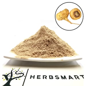 May include: A pile of light brown maca powder on a white plate. A close-up image of two whole maca roots is shown in the upper right corner of the image. The text "HERBSMART" is visible in the lower right corner of the image.