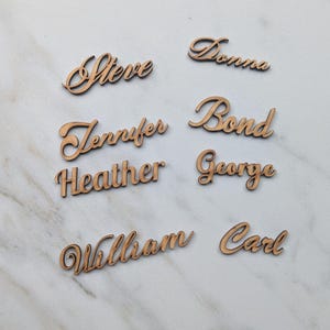 Wood place cards| Laser cut names| wedding place cards| custom table names| birthday names| party decoration name tags| name cutout.