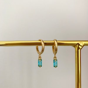 18kt gold plated December birthstone huggie hoop earrings