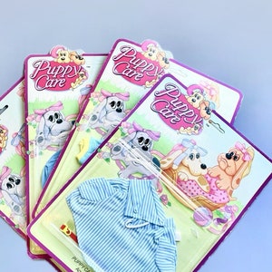 Abbigliamento Hornby Puppy Care, giocattoli vintage anni &#39;80 con illustrazioni pastello, confezioni morbide e carine con cuccioli degli anni &#39;80. SCEGLI IL TUO