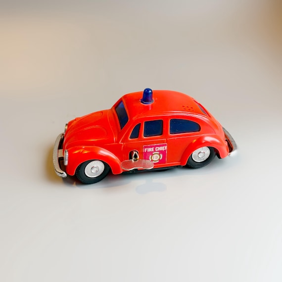 Wind up Wolkswagen Beetle Fire Chief Car WITH SIREN, Wind up