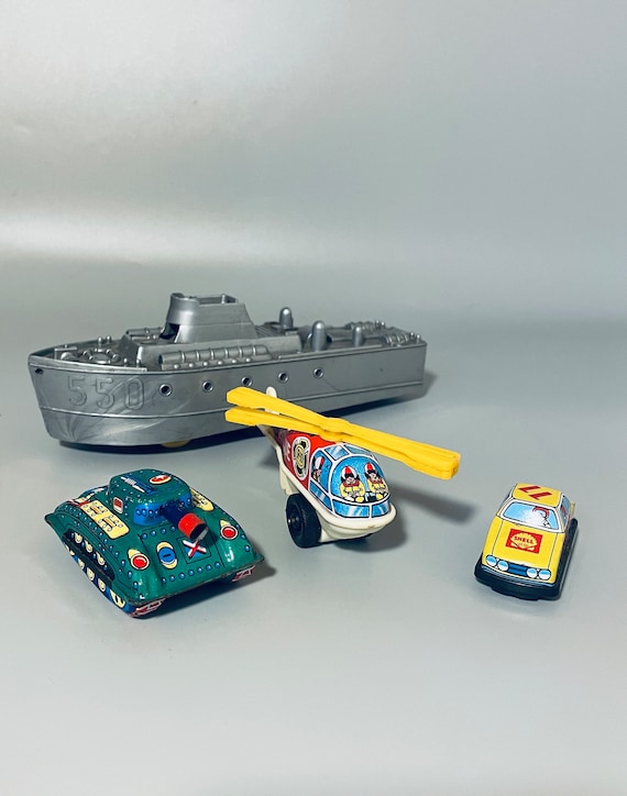 Tin hotsell toy battleship