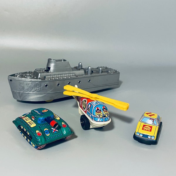 Friction Toys, Lithograph Tin Ornaments, Vintage Friction Toys Made In Japan, Litho Tank, Tin Helicopter, Plastic Battleship &  Shell Car