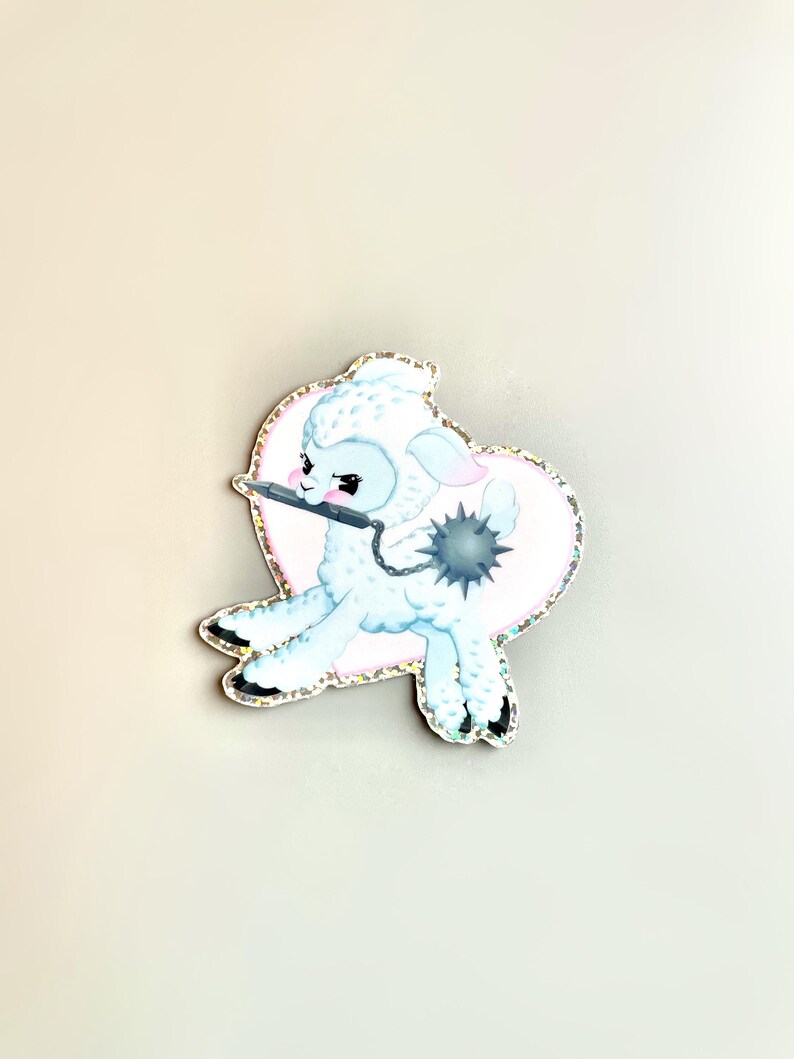 May include: A blue and white cartoon lamb with a pink heart behind it. The lamb is holding a spiked club and has an angry expression.
