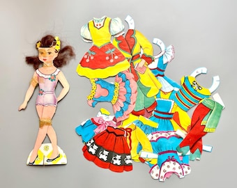 Muñeca de papel de los años 50 con pelo, muñeca de papel y atuendos, muñecas de papel vintage ilustradas, muñecas de papel de los años 60, paquete de vestidos recortados.