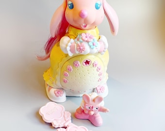 Conejo alegre de Keypers, conejo rosa vintage de Tonka Keypers con localizador de pajarita, juguete para niñas de los 80, raro conejito rosa grande