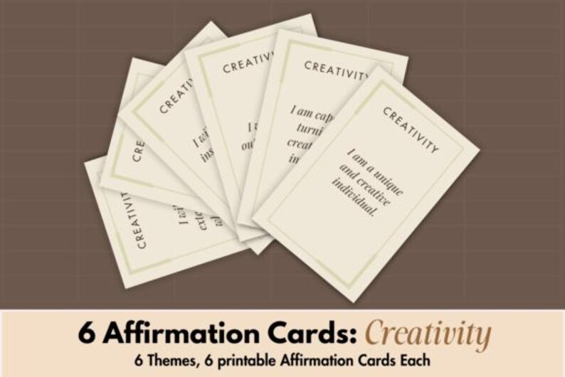 May include: A collection of cream-coloured affirmation cards, each bearing the word "CREATIVITY" at the top. Each card features a unique affirmation statement. The cards are arranged on a brown backdrop. The image includes text at the bottom: "6 Affirmation Cards: Creativity".