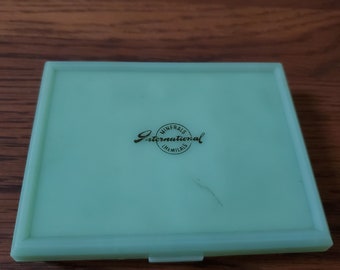 Vintage playing cards in jadeite colored case