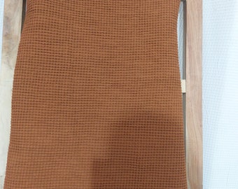 Manta decorativa tipo gofre color óxido con borlas - 52 x 72 pulgadas