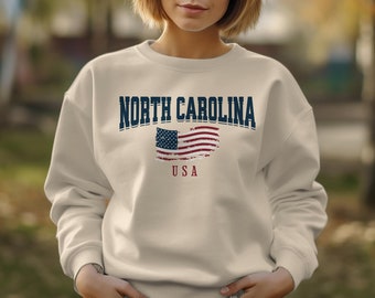 Bluza z kapturem Karolina Północna, bluza z okrągłym dekoltem Karolina Północna, prezenty Karolina Północna, koszulki z flagą stanu Karolina Północna, koszulki z swetrem Karolina Północna